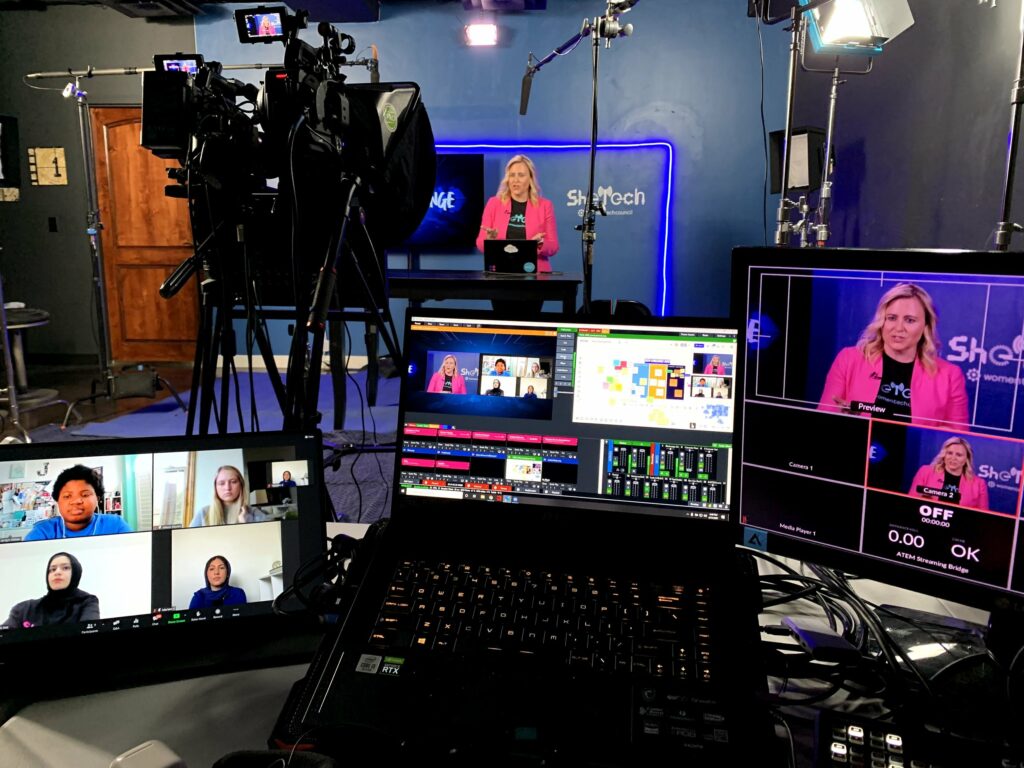 Livestreaming equipment capturing a woman speaking at SheTech.