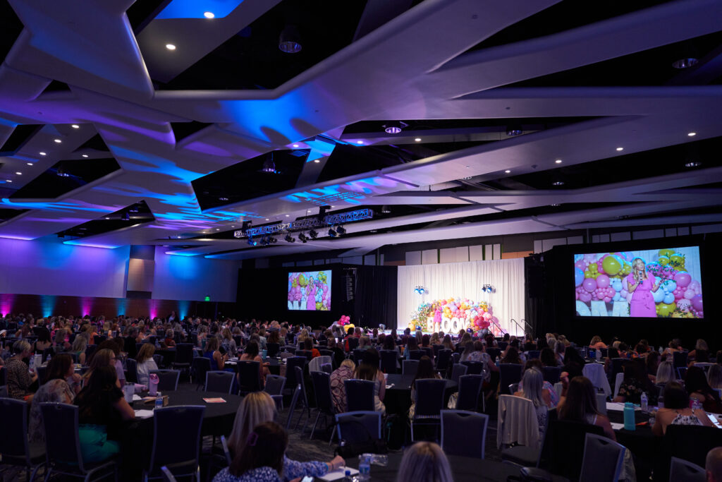 Large event at the Utah Valley Convention Center in the Grand Ballroom. Lighting, audio, and visual done by Charisma Event Productions.
